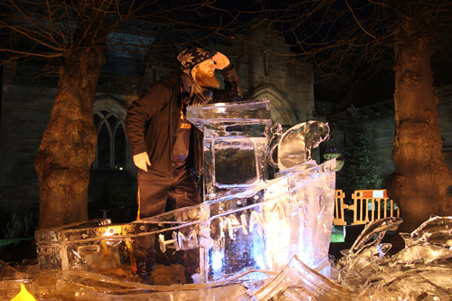 Jamie Wardley on an ice boat sculpture