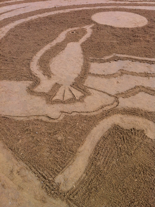 penguin sand drawing