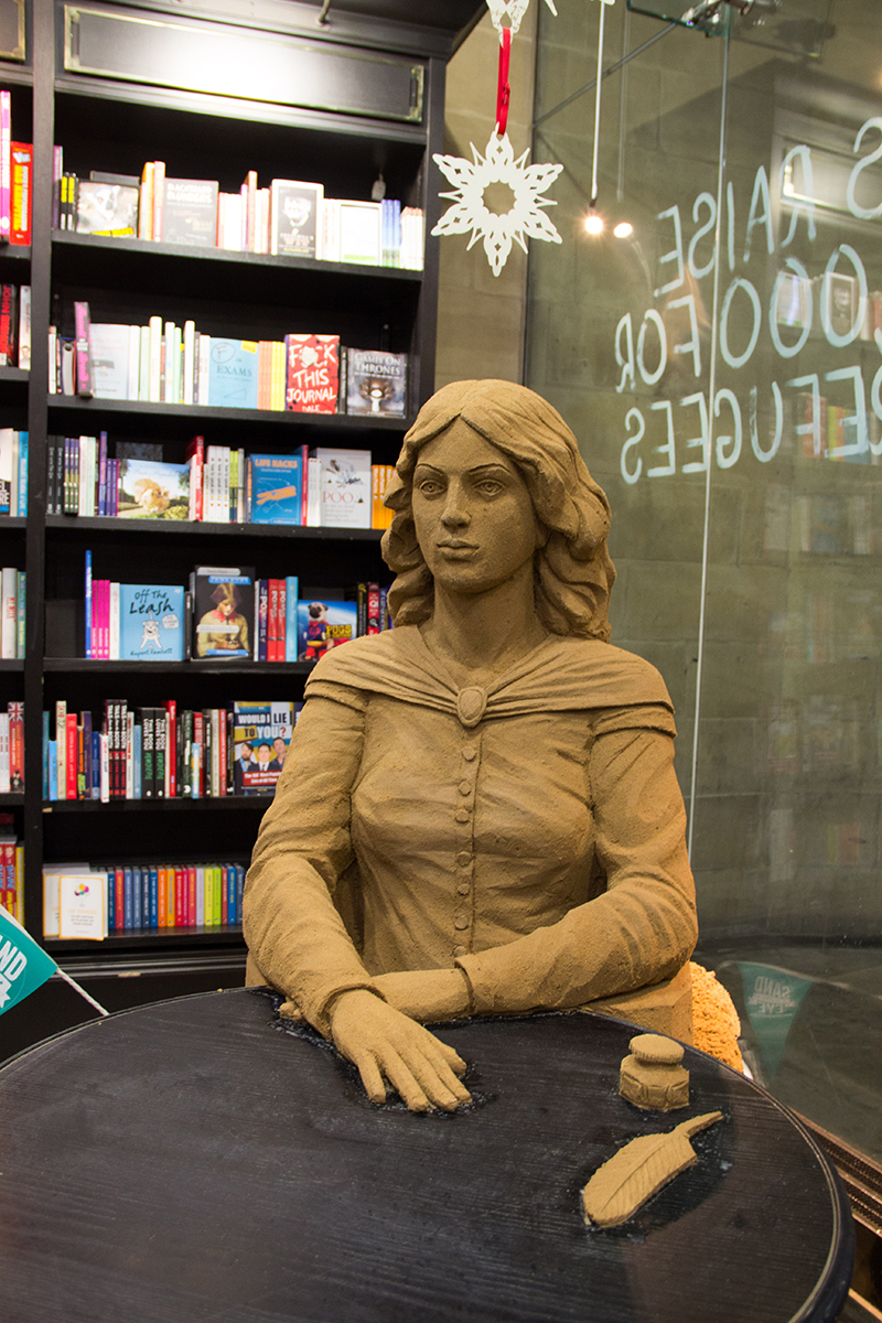 The Emily Bronte sand sculpture sitting in Waterstones, Bradford