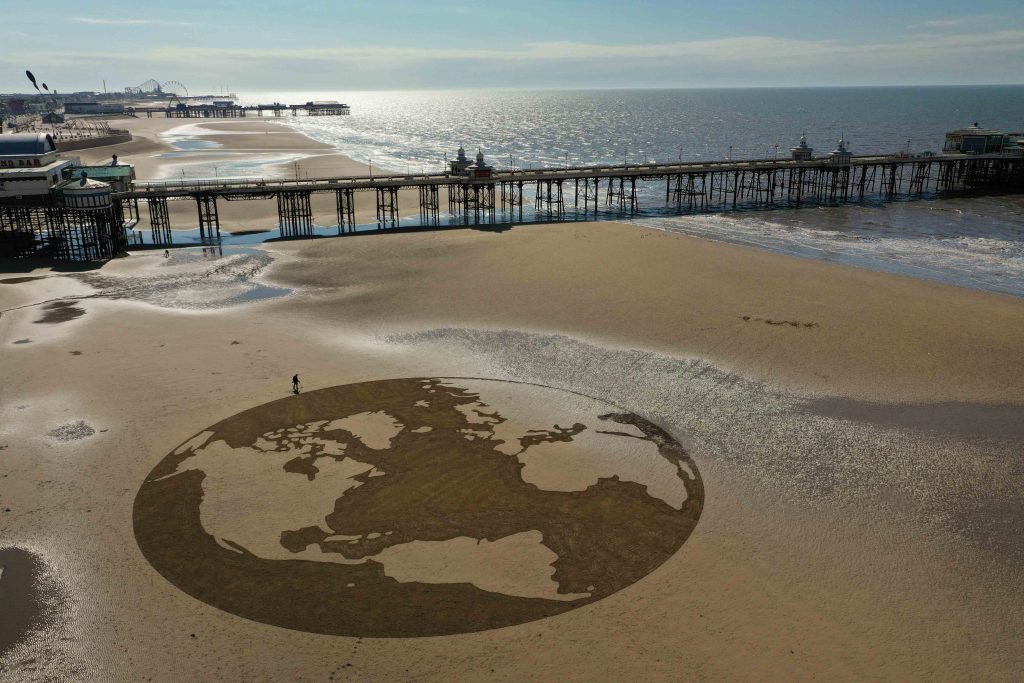 The globe sand drawing