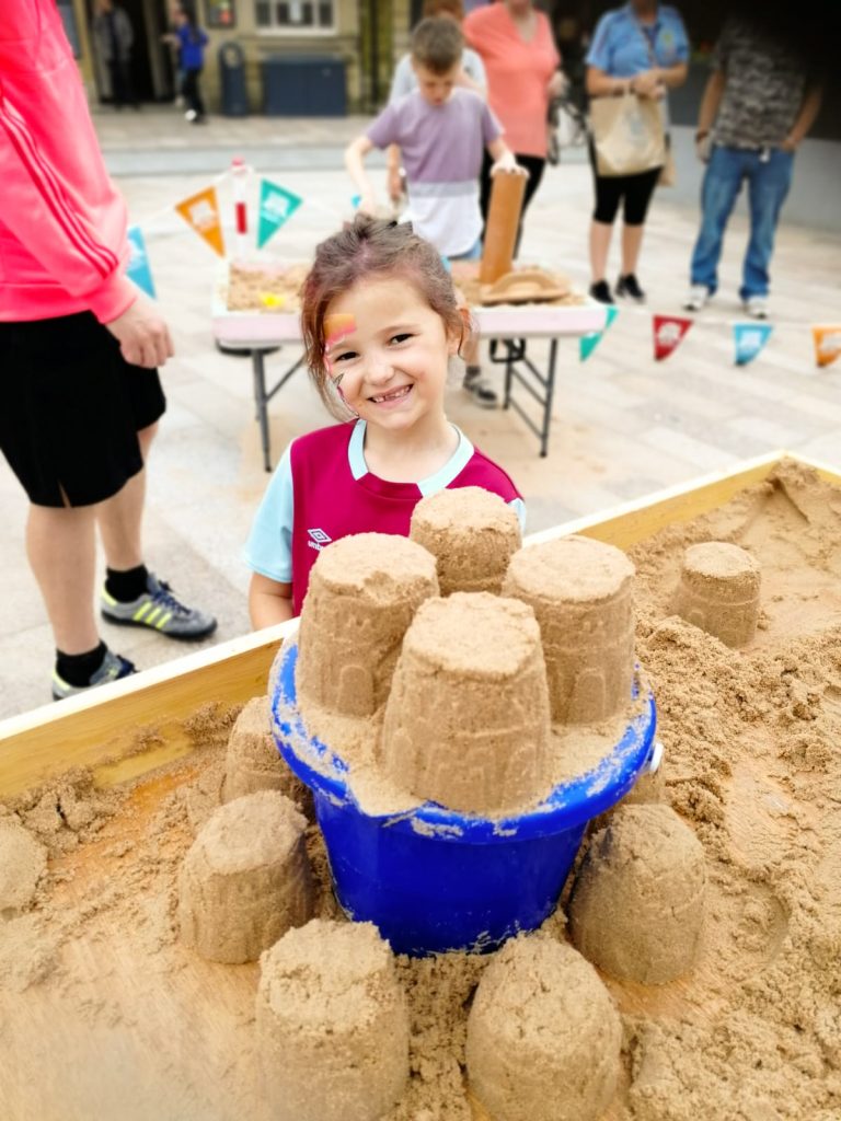 kids sand sculpture workshops